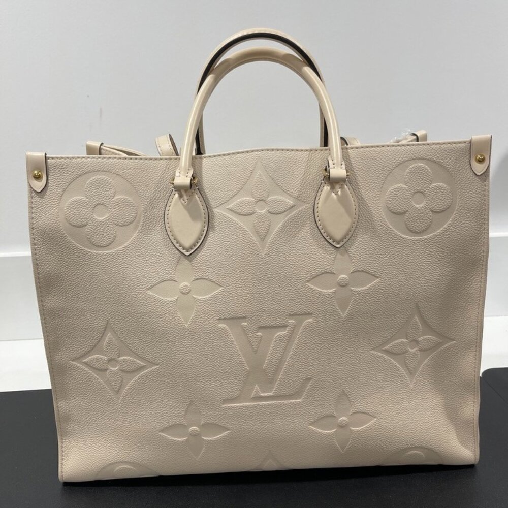 Louis Vuitton On The Go GM Monogram Cream Empreinte Leather (127536)
